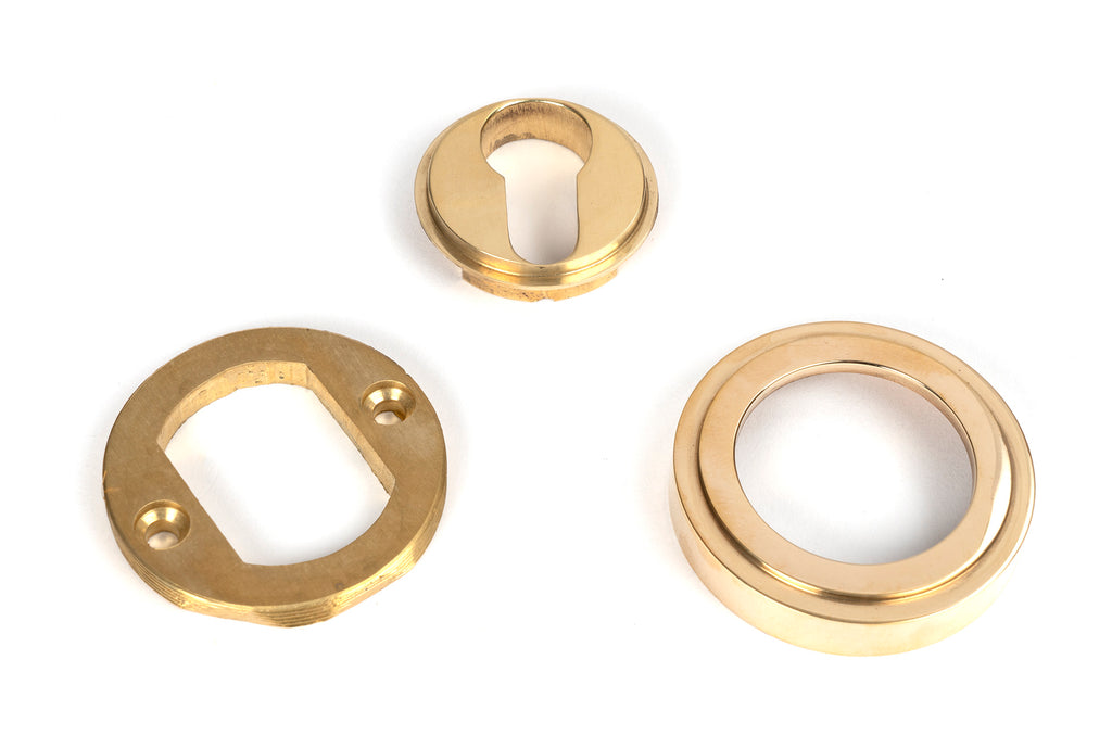 White background image of From The Anvil's Polished Brass Round Euro Escutcheon | From The Anvil