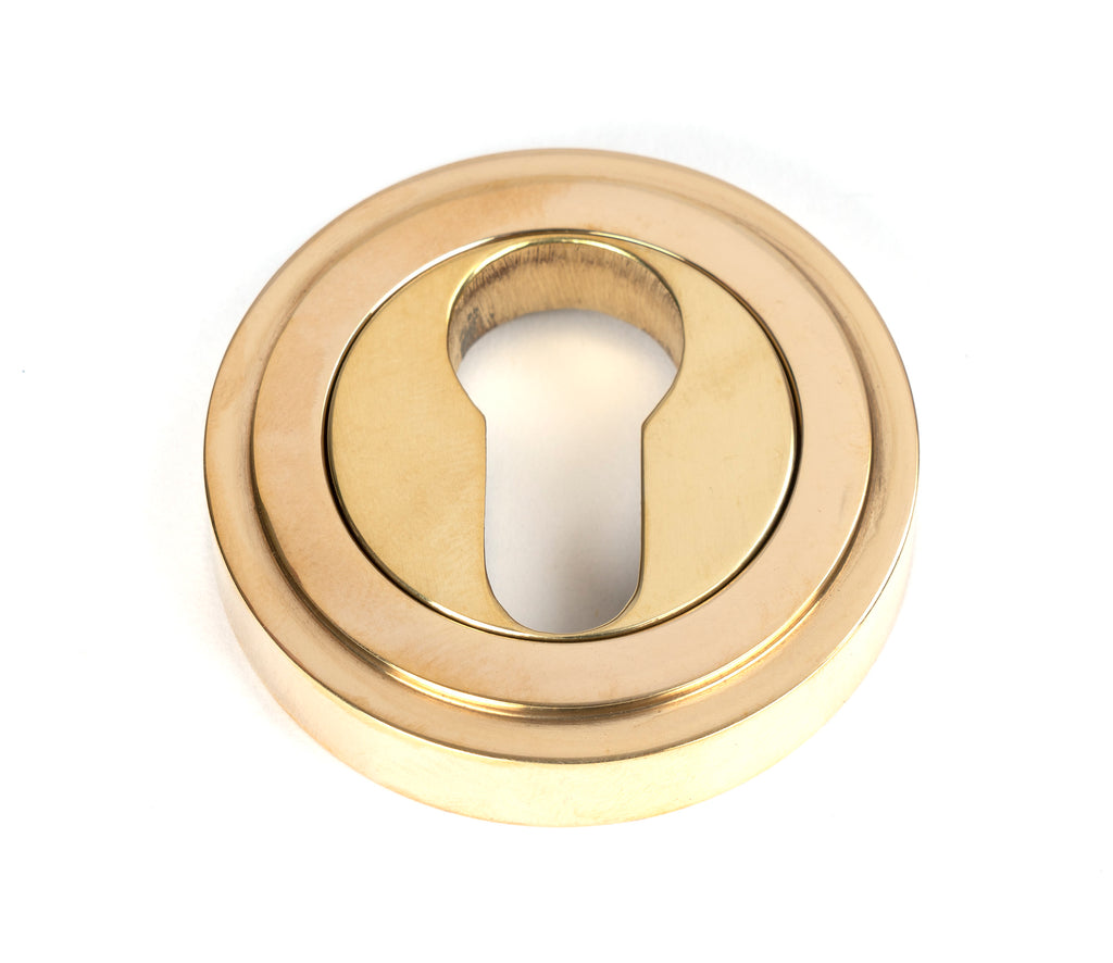 White background image of From The Anvil's Polished Brass Round Euro Escutcheon | From The Anvil