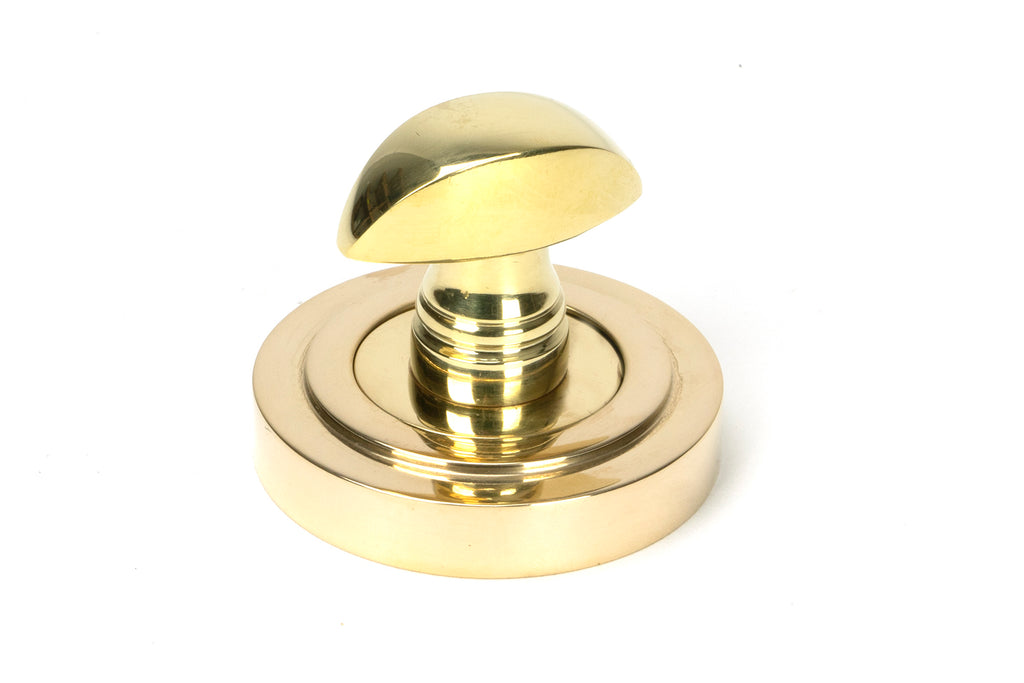 White background image of From The Anvil's Polished Brass Round Thumbturn Set | From The Anvil