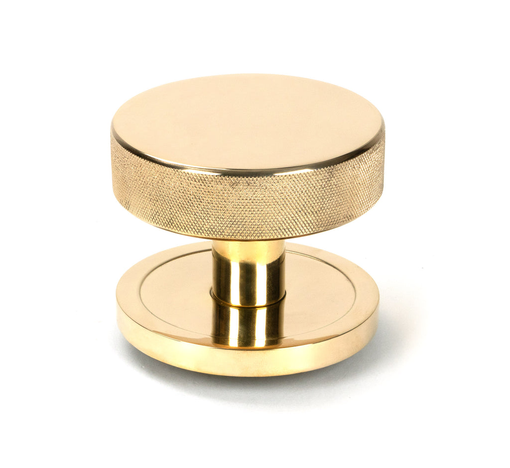 White background image of From The Anvil's Polished Brass Brompton Centre Door Knob | From The Anvil