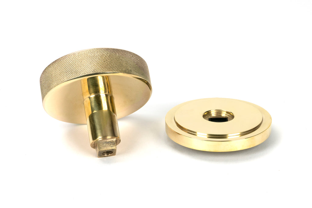 White background image of From The Anvil's Polished Brass Brompton Centre Door Knob | From The Anvil