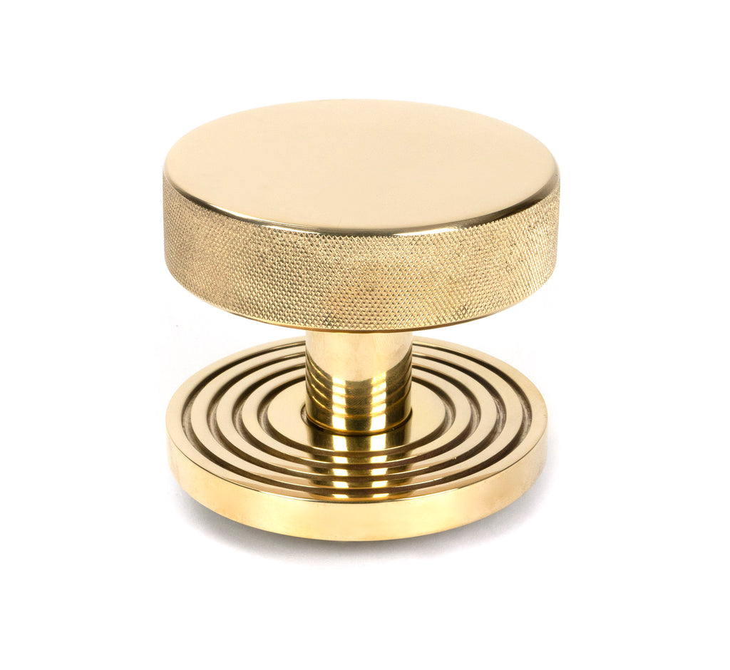 White background image of From The Anvil's Polished Brass Brompton Centre Door Knob | From The Anvil