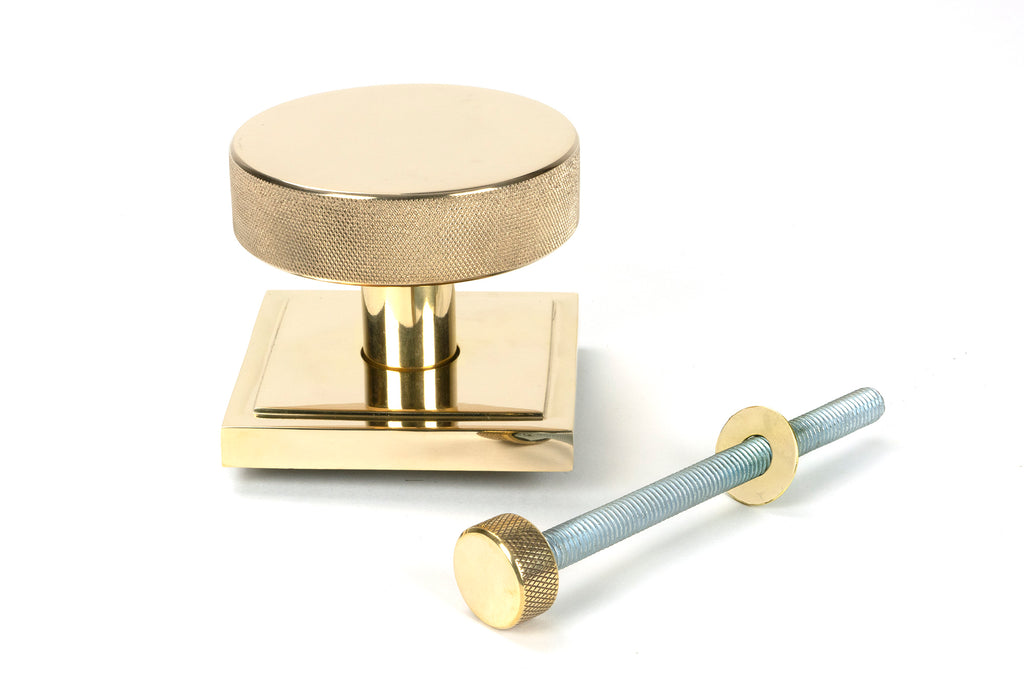 White background image of From The Anvil's Polished Brass Brompton Centre Door Knob | From The Anvil
