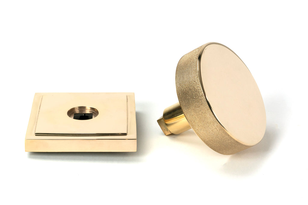 White background image of From The Anvil's Polished Brass Brompton Centre Door Knob | From The Anvil