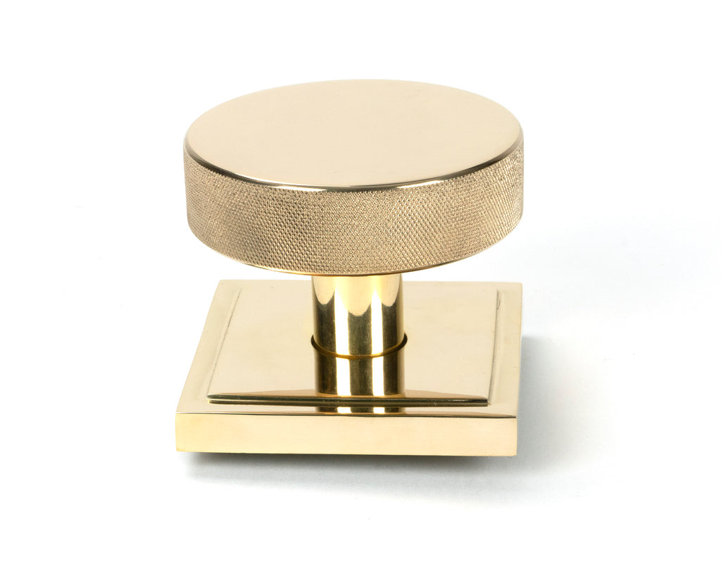 White background image of From The Anvil's Polished Brass Brompton Centre Door Knob | From The Anvil