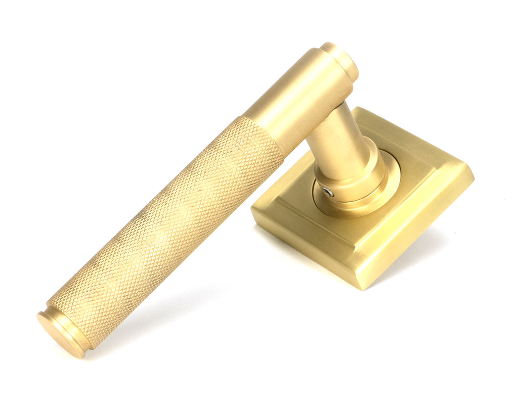 White background image of From The Anvil's Satin Brass Brompton Lever on Rose Set (Sprung) | From The Anvil