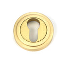 From The Anvil's Satin Brass Round Euro Escutcheon