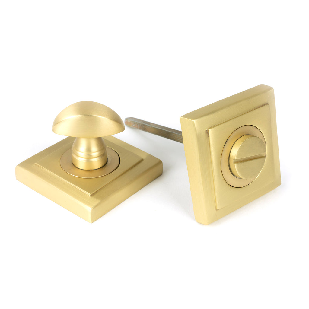 White background image of From The Anvil's Satin Brass Round Thumbturn Set | From The Anvil