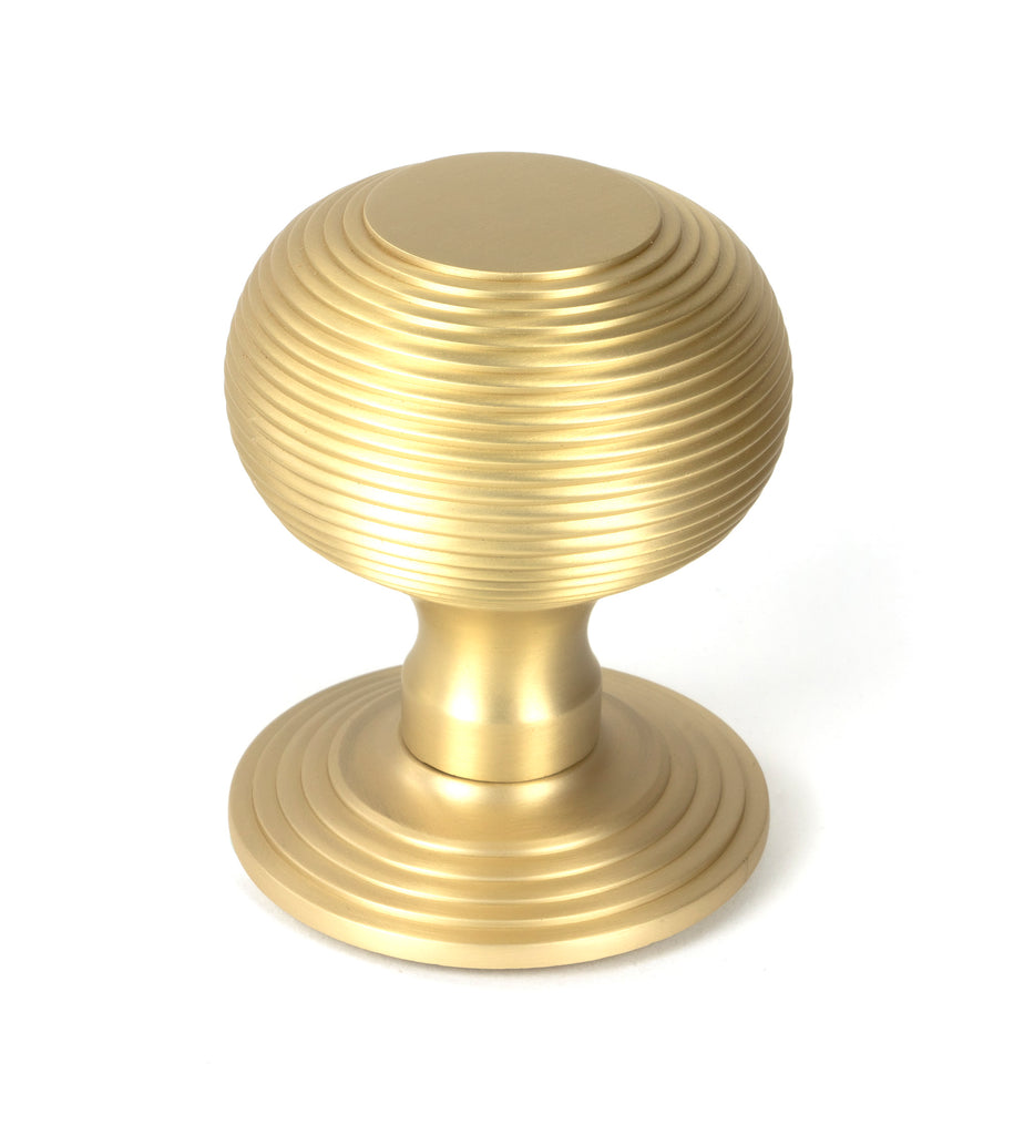White background image of From The Anvil's Satin Brass Beehive Centre Door Knob | From The Anvil