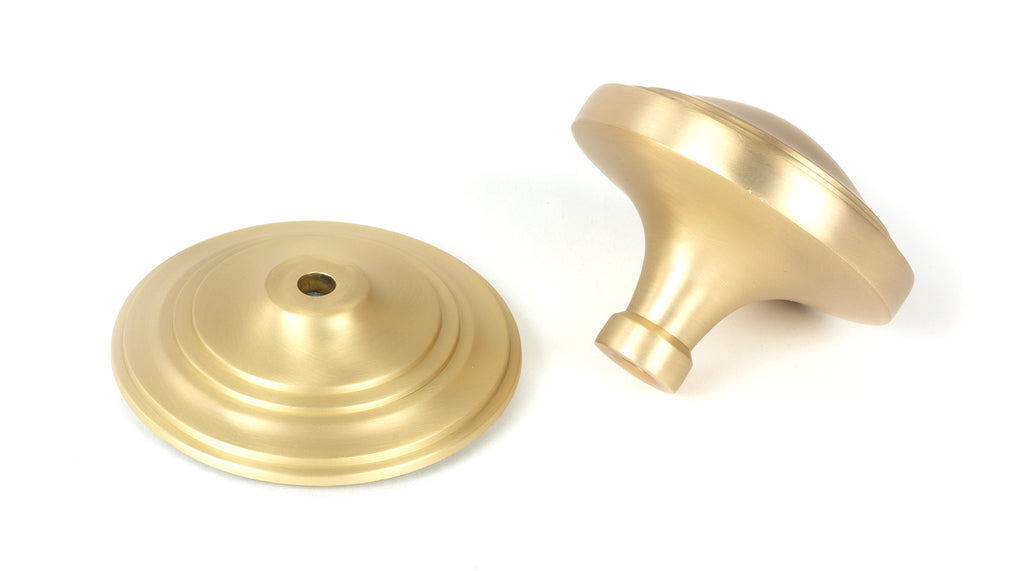 White background image of From The Anvil's Satin Brass Art Deco Centre Door Knob | From The Anvil