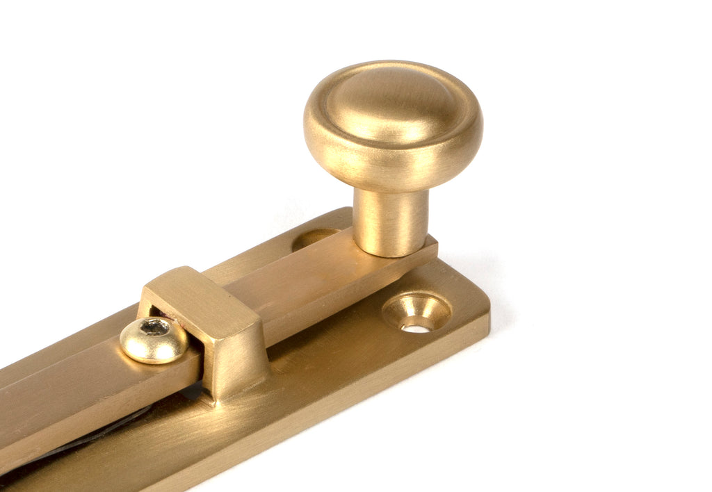 White background image of From The Anvil's Satin Brass Universal Bolt | From The Anvil