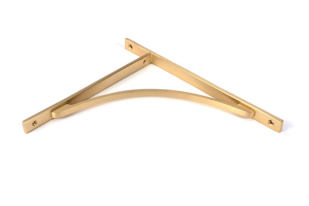 White background image of From The Anvil's Satin Brass Apperley Shelf Bracket | From The Anvil