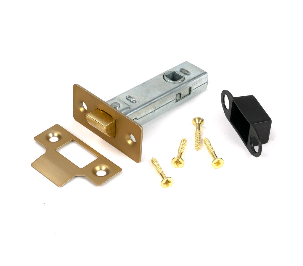 White background image of From The Anvil's Satin Brass 3" Tubular Mortice Latch