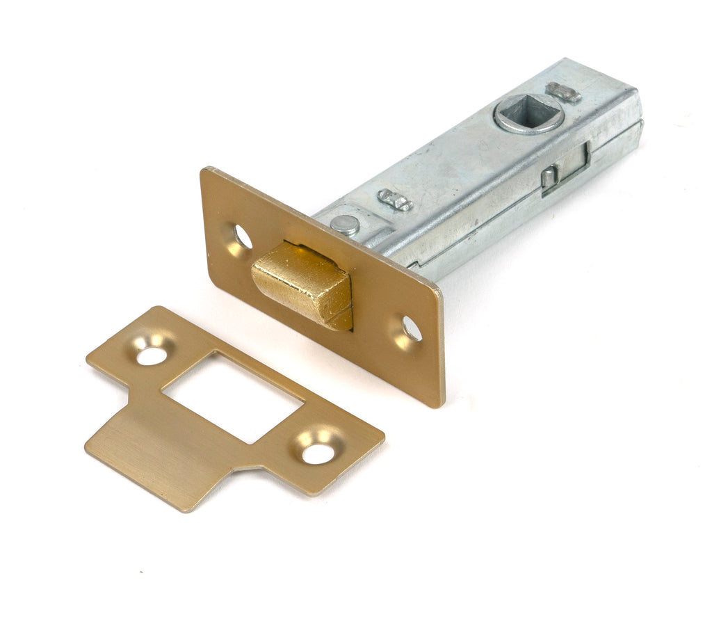 White background image of From The Anvil's Satin Brass 3" Tubular Mortice Latch