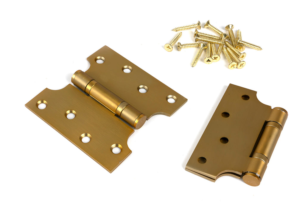 White background image of From The Anvil's Satin Brass 4" x 2" x 4"  Parliament Hinge (pair) ss