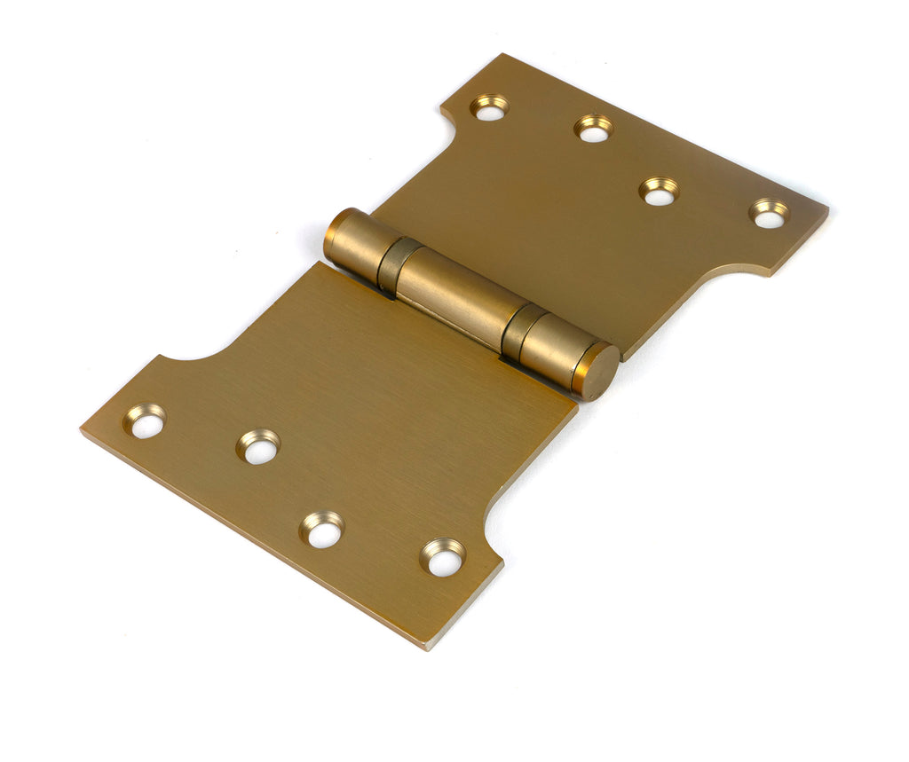 White background image of From The Anvil's Satin Brass 4" x 4" x 6" Parliament Hinge (pair) ss