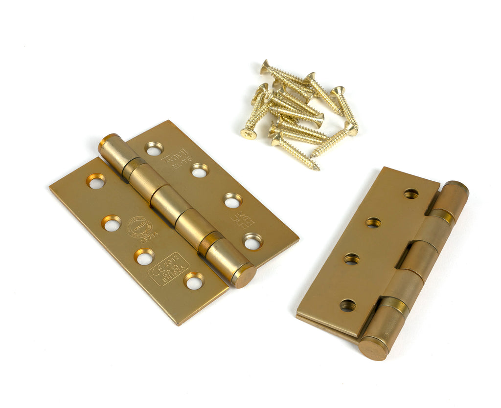 White background image of From The Anvil's Satin Brass 4" Ball Bearing Butt Hinge (Pair) ss