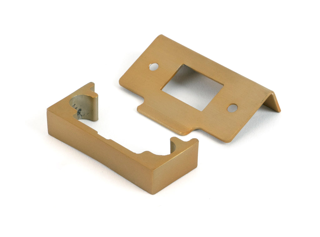 White background image of From The Anvil's Satin Brass ½" Rebate Kit for Tubular Mortice Latch