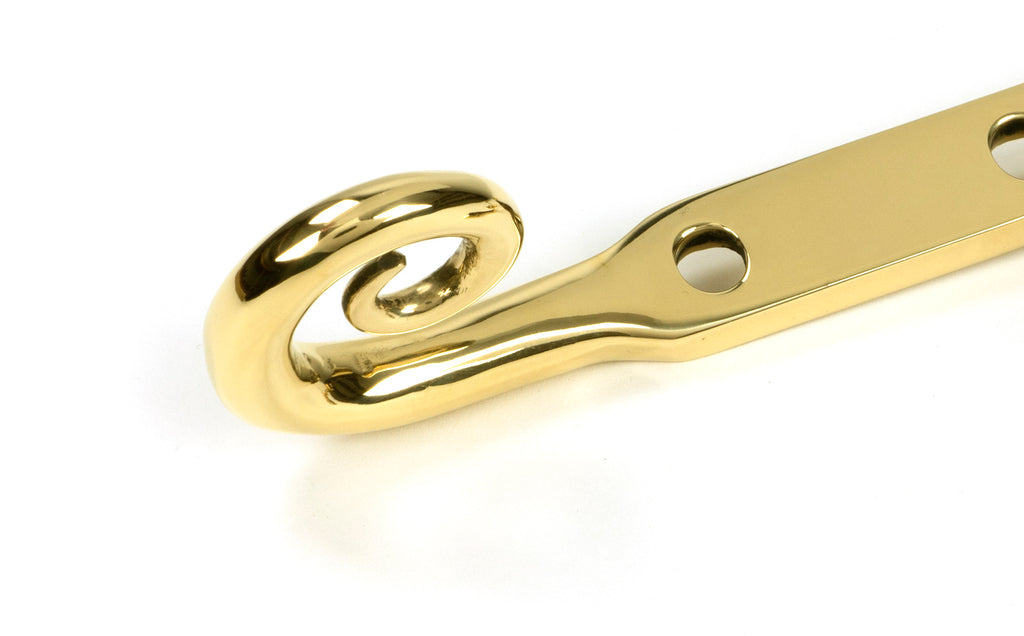 White background image of From The Anvil's Polished Brass 10" Monkeytail Stay (Steel Window)