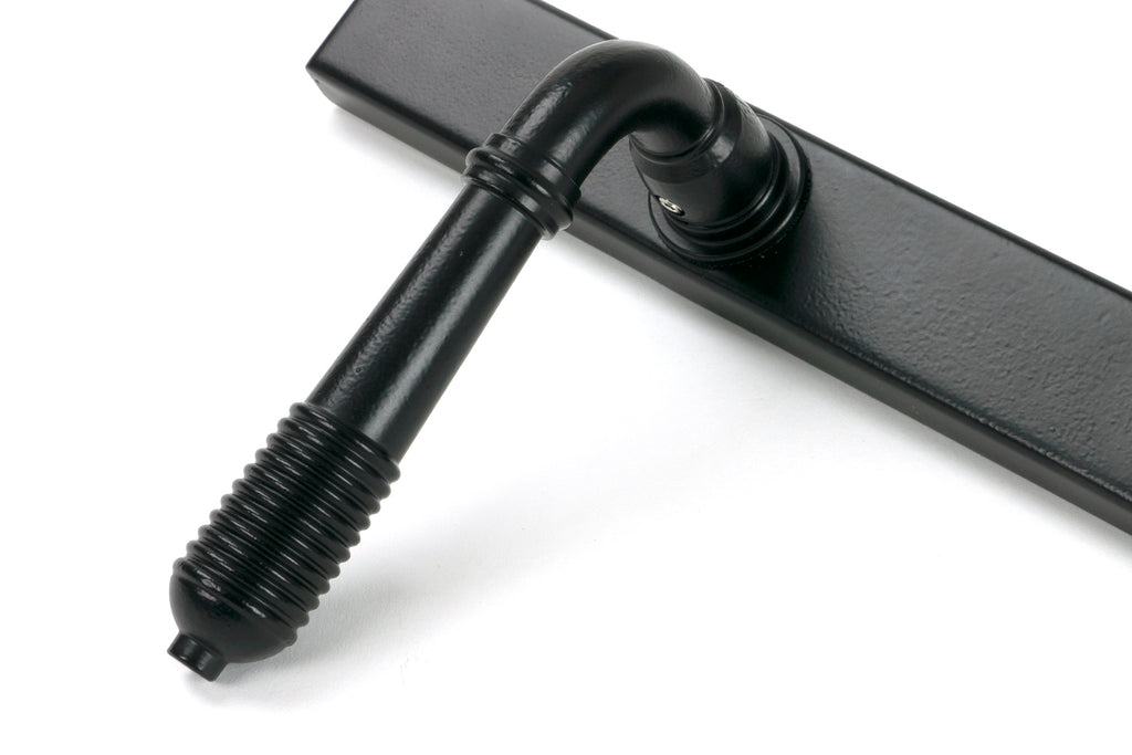 White background image of From The Anvil's Matt Black Reeded Slimline Lever Espag. Lock Set