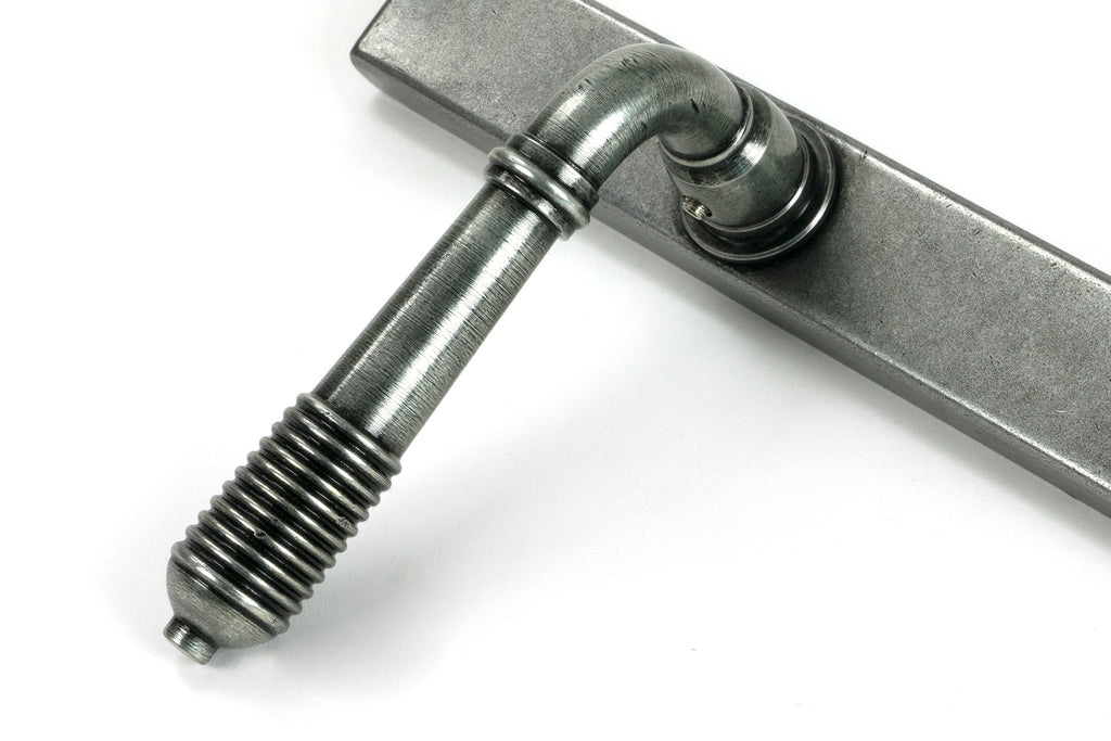 White background image of From The Anvil's Pewter Reeded Slimline Lever Espag. Lock Set