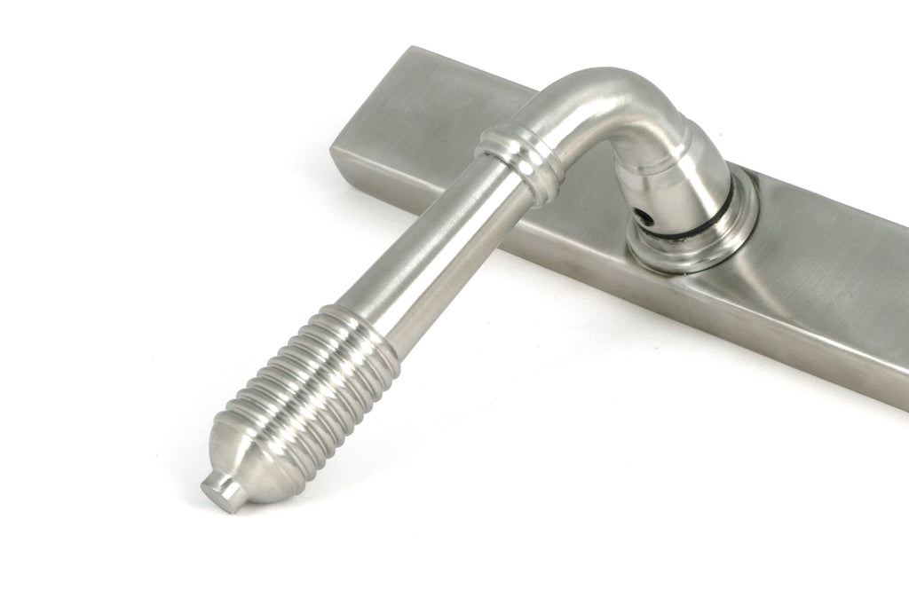 White background image of From The Anvil's Satin Marine SS (316) Reeded Slimline Lever Espag. Lock Set