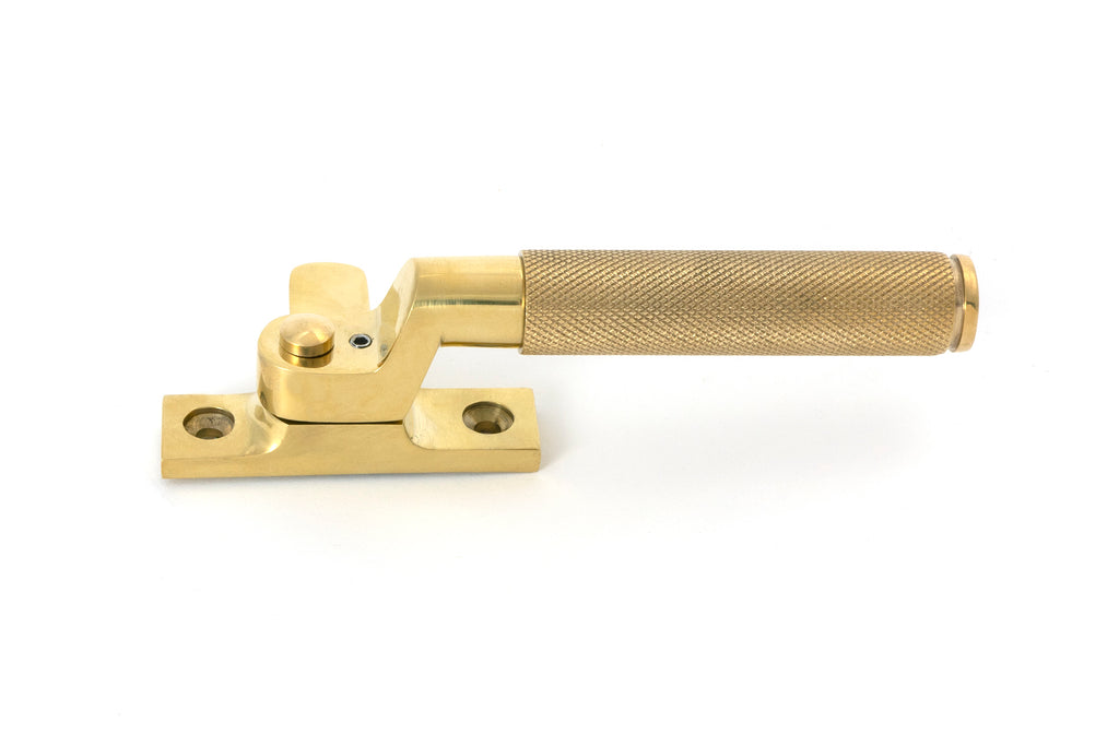 White background image of From The Anvil's Polished Brass Locking Brompton Fastener – LH