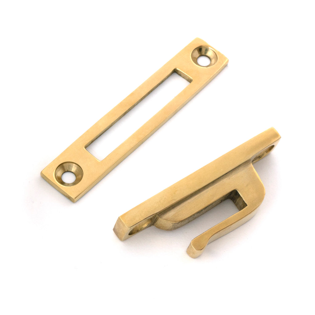 White background image of From The Anvil's Polished Brass Locking Brompton Fastener – LH