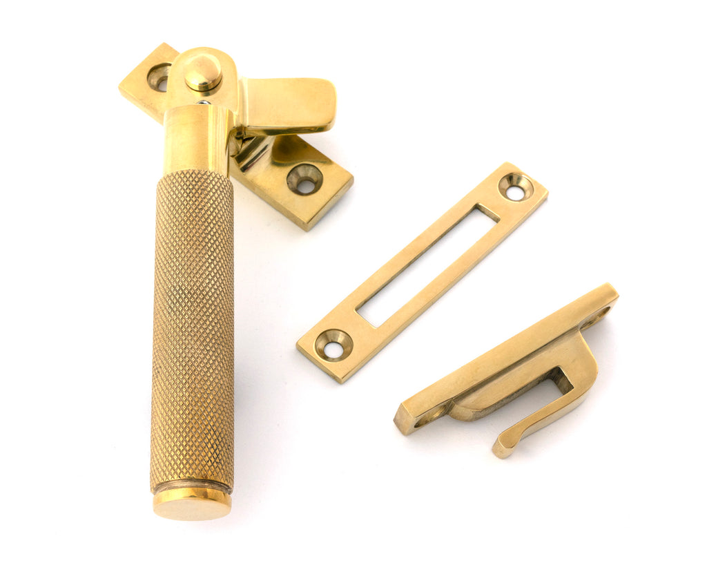 White background image of From The Anvil's Polished Brass Locking Brompton Fastener – LH