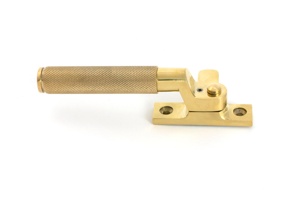 White background image of From The Anvil's Polished Brass Locking Brompton Fastener – RH