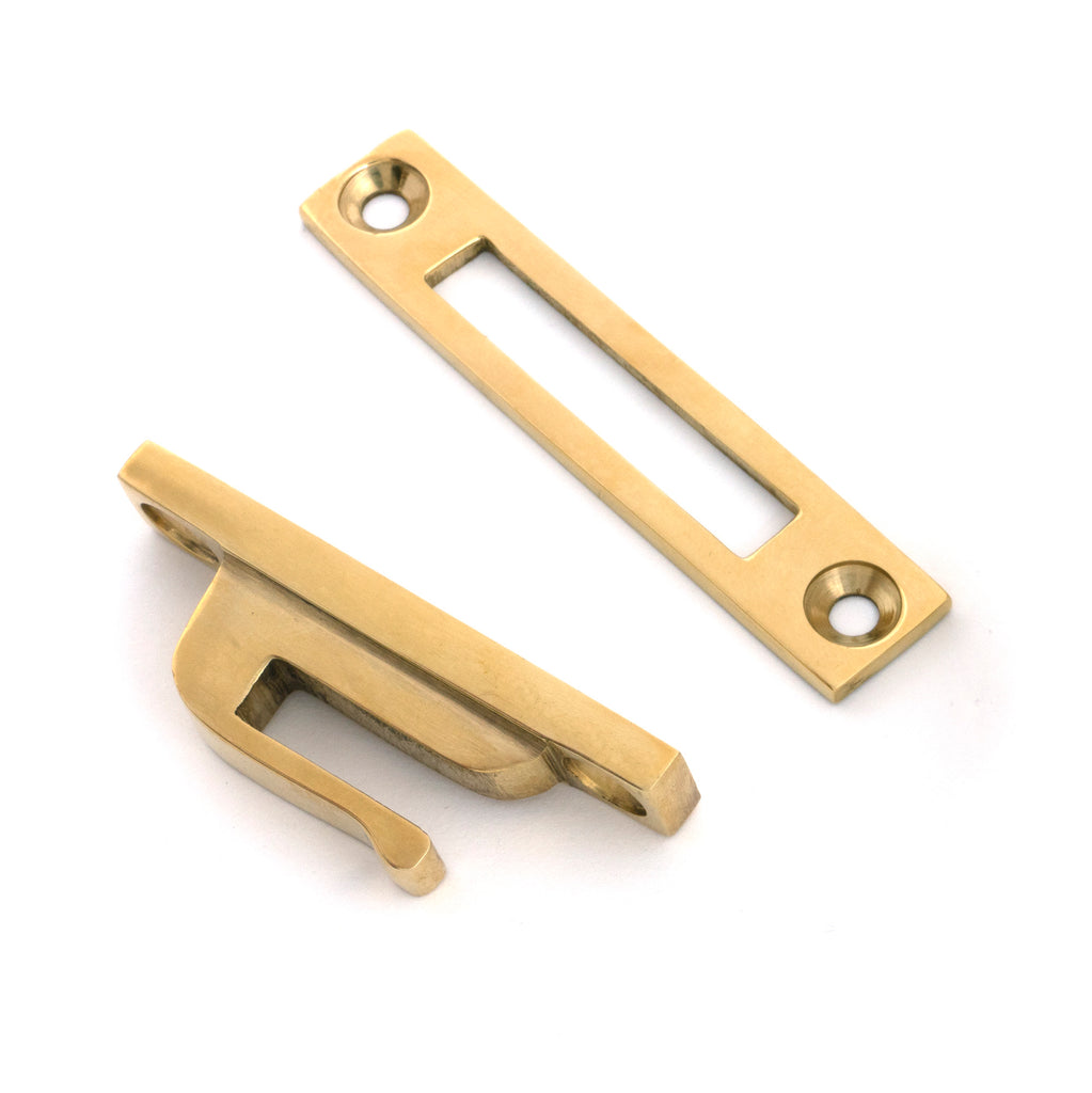 White background image of From The Anvil's Polished Brass Locking Brompton Fastener – RH