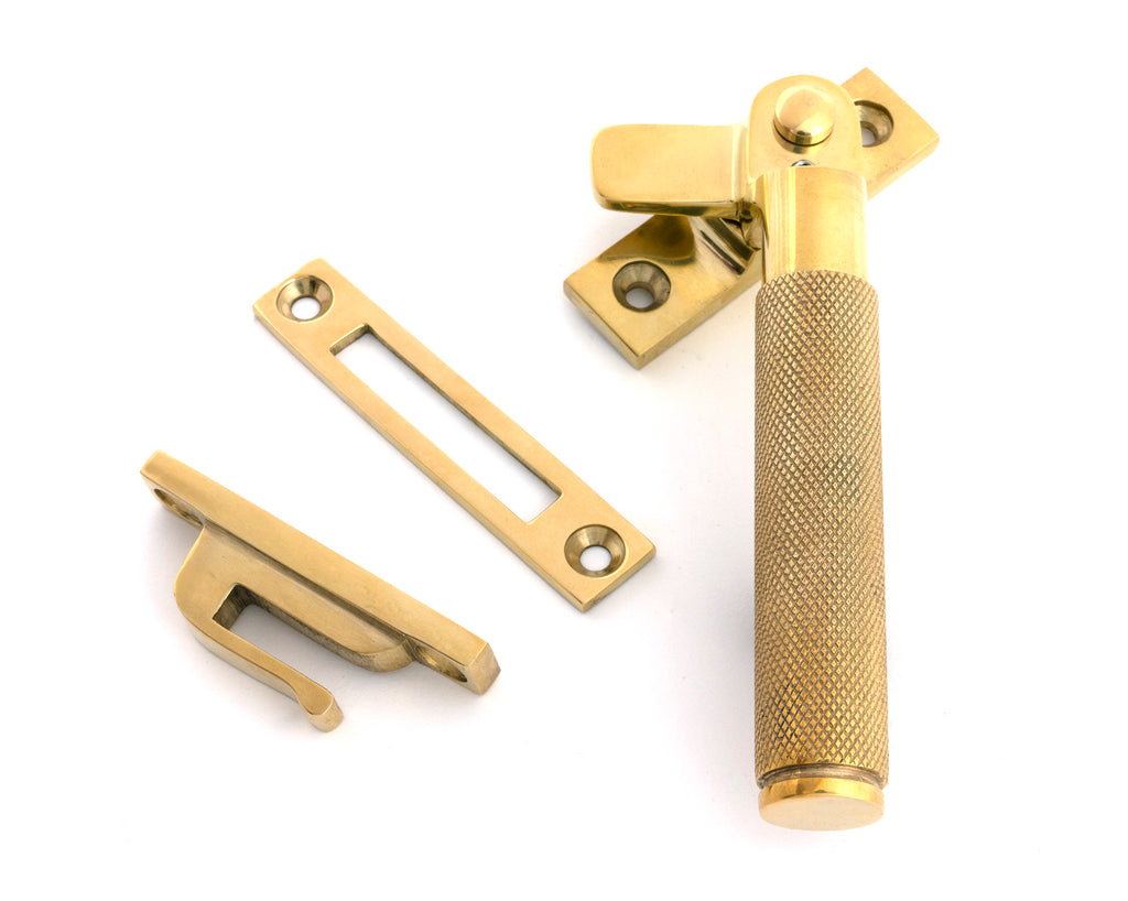 White background image of From The Anvil's Polished Brass Locking Brompton Fastener – RH