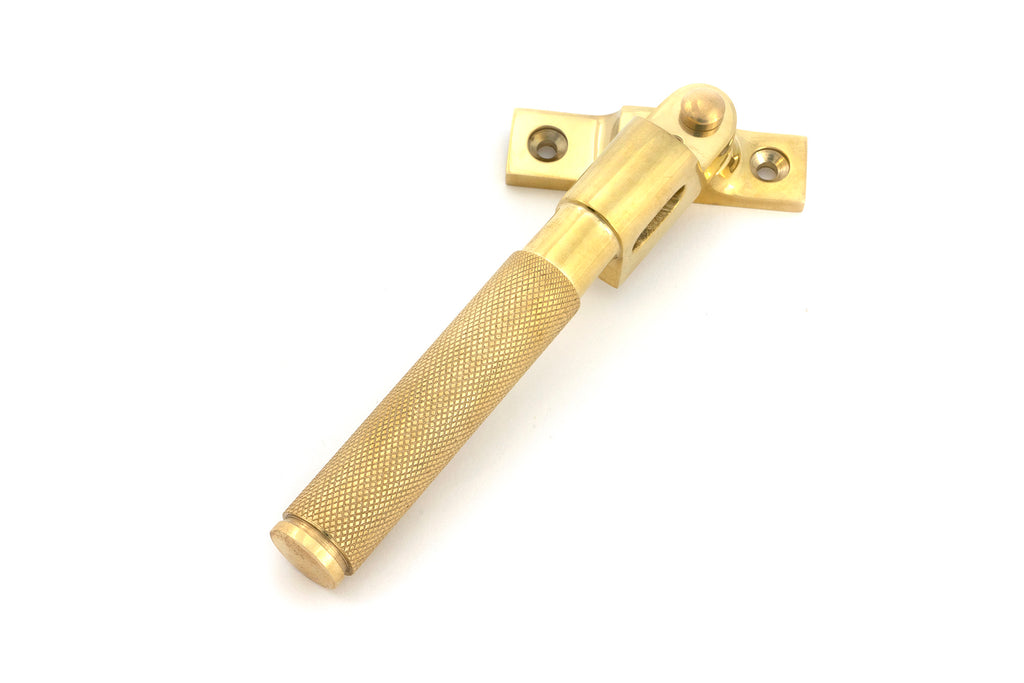 White background image of From The Anvil's Polished Brass Night-Vent Locking Brompton Fastener