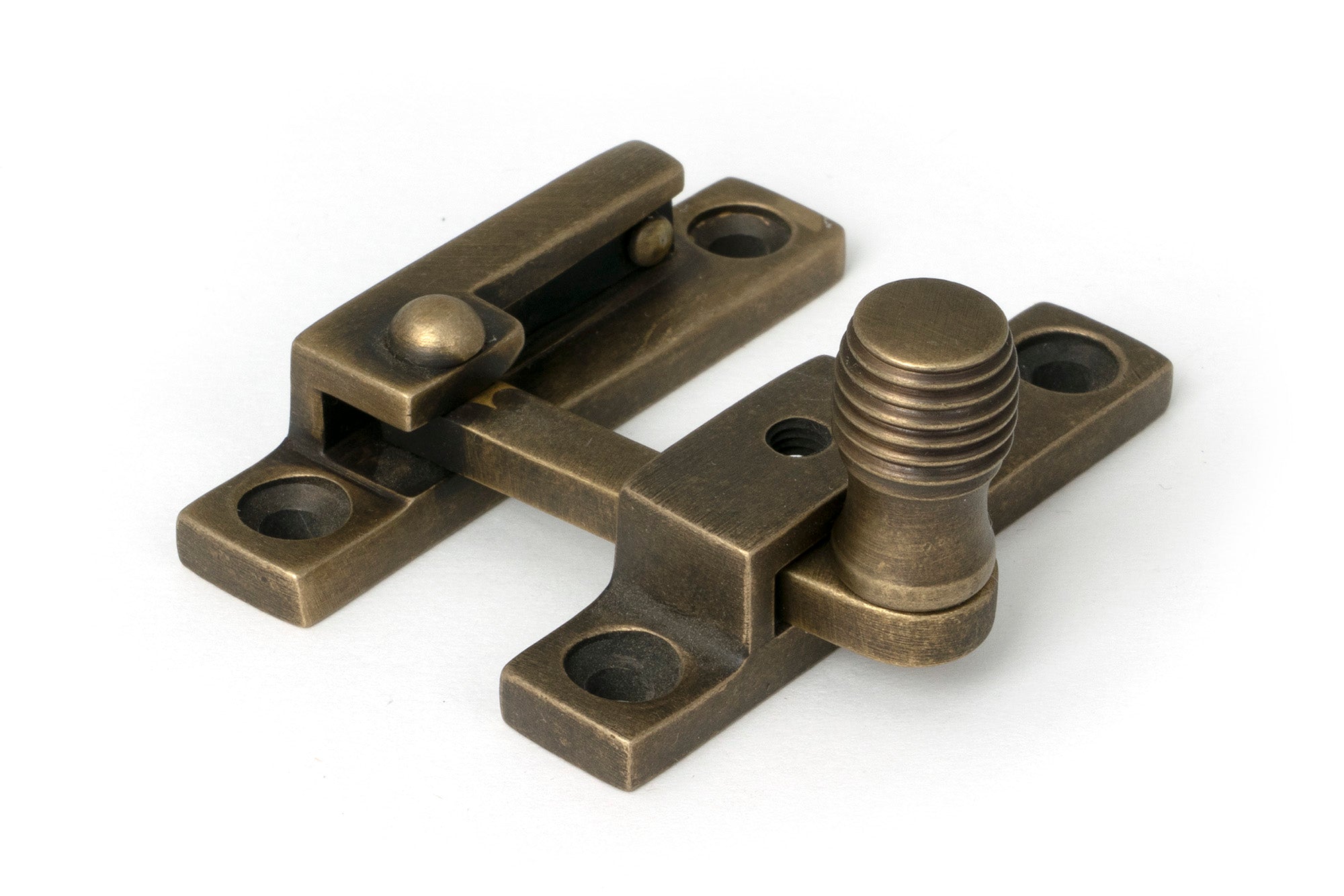 From The Anvil's Burnished Brass Beehive Quadrant Fastener - Narrow