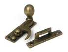 From The Anvil's Burnished Brass Sash Hook Fastener