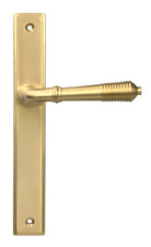 From The Anvil's Satin Brass Reeded Slimline Lever Espag. Latch Set