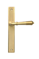 From The Anvil's Satin Brass Reeded Slimline Lever Espag. Latch Set