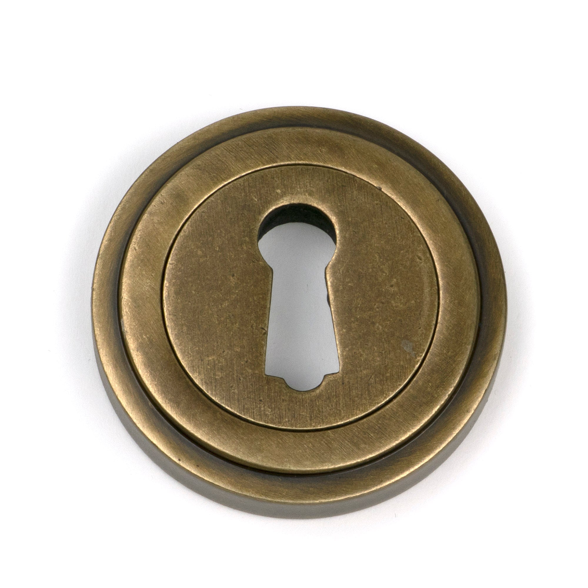 From The Anvil's Burnished Brass Round Escutcheon
