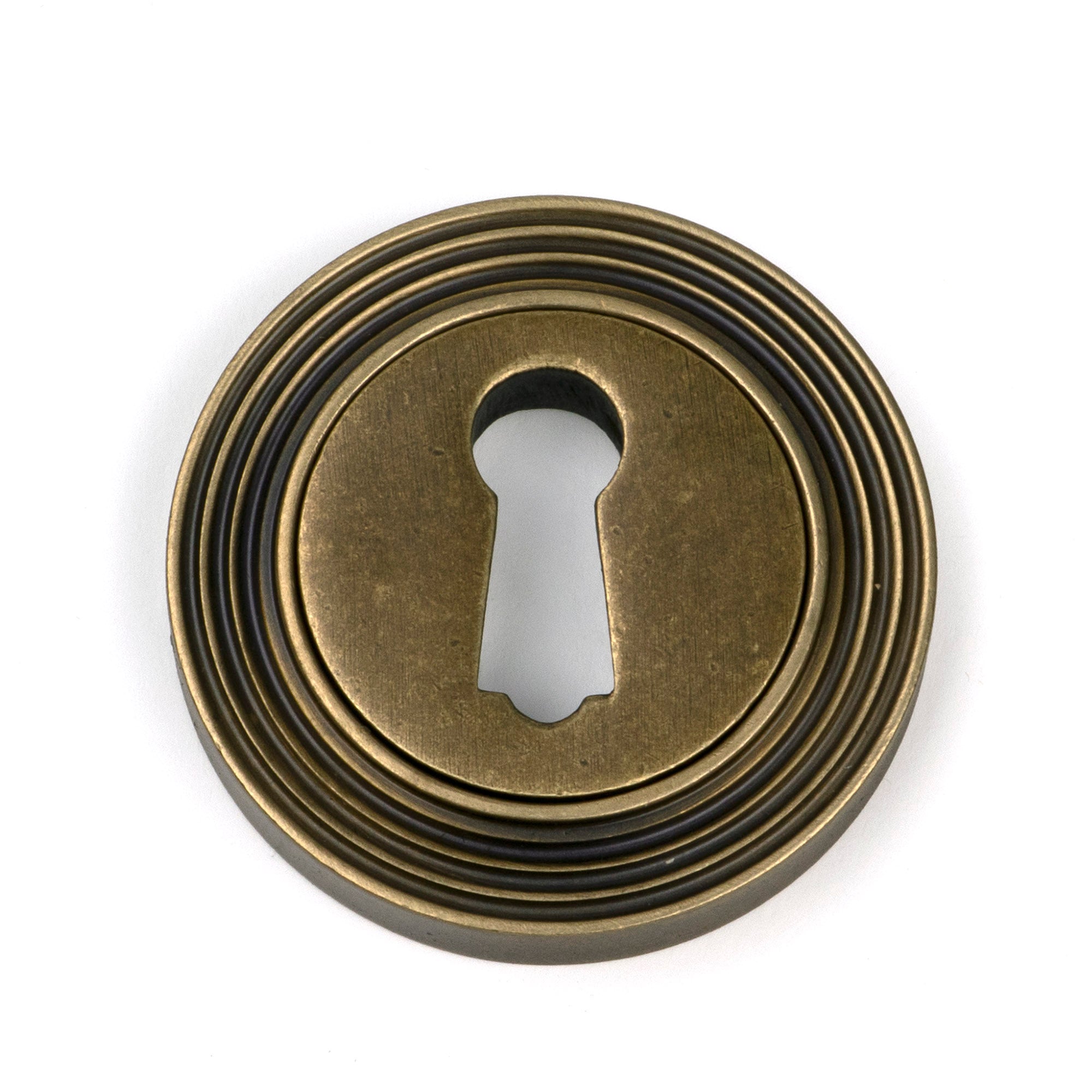 From The Anvil's Burnished Brass Round Escutcheon