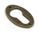 From The Anvil's Burnished Brass Oval Euro Escutcheon