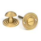 From The Anvil's Satin Brass Round Thumbturn Set