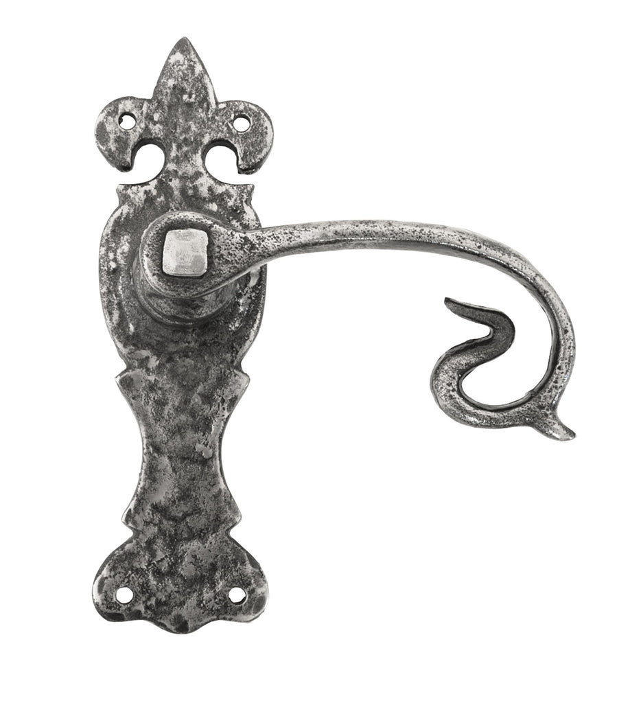 White background image of From The Anvil's Natural Textured Curly Lever Latch Set | From The Anvil