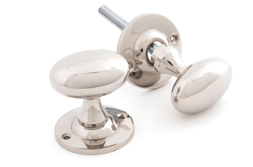 White background image of From The Anvil's Polished Nickel Oval Mortice/Rim Knob Set | From The Anvil