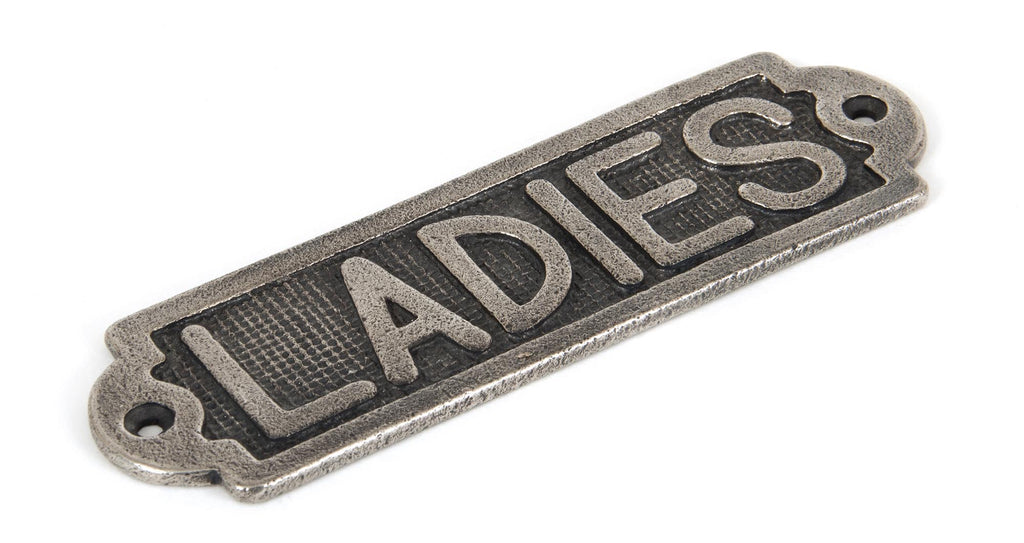 White background image of From The Anvil's Antique Pewter Ladies Sign | From The Anvil