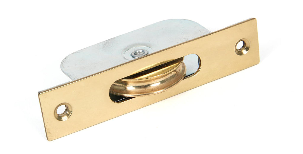 White background image of From The Anvil's Lacquered Brass Square Ended Sash Pulley 75kg | From The Anvil