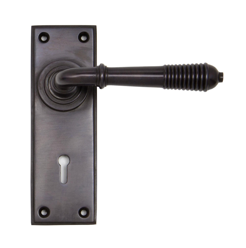 White background image of From The Anvil's Aged Bronze Reeded Lever Lock Set | From The Anvil