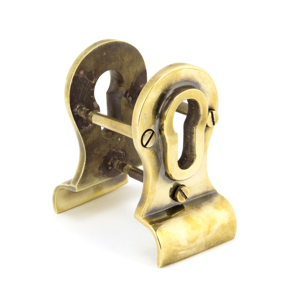 White background image of From The Anvil's Aged Brass 50mm Euro Door Pull (Back to Back Fixings) | From The Anvil