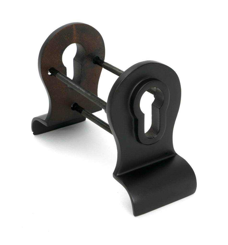 White background image of From The Anvil's Aged Bronze 50mm Euro Door Pull (Back to Back Fixings) | From The Anvil