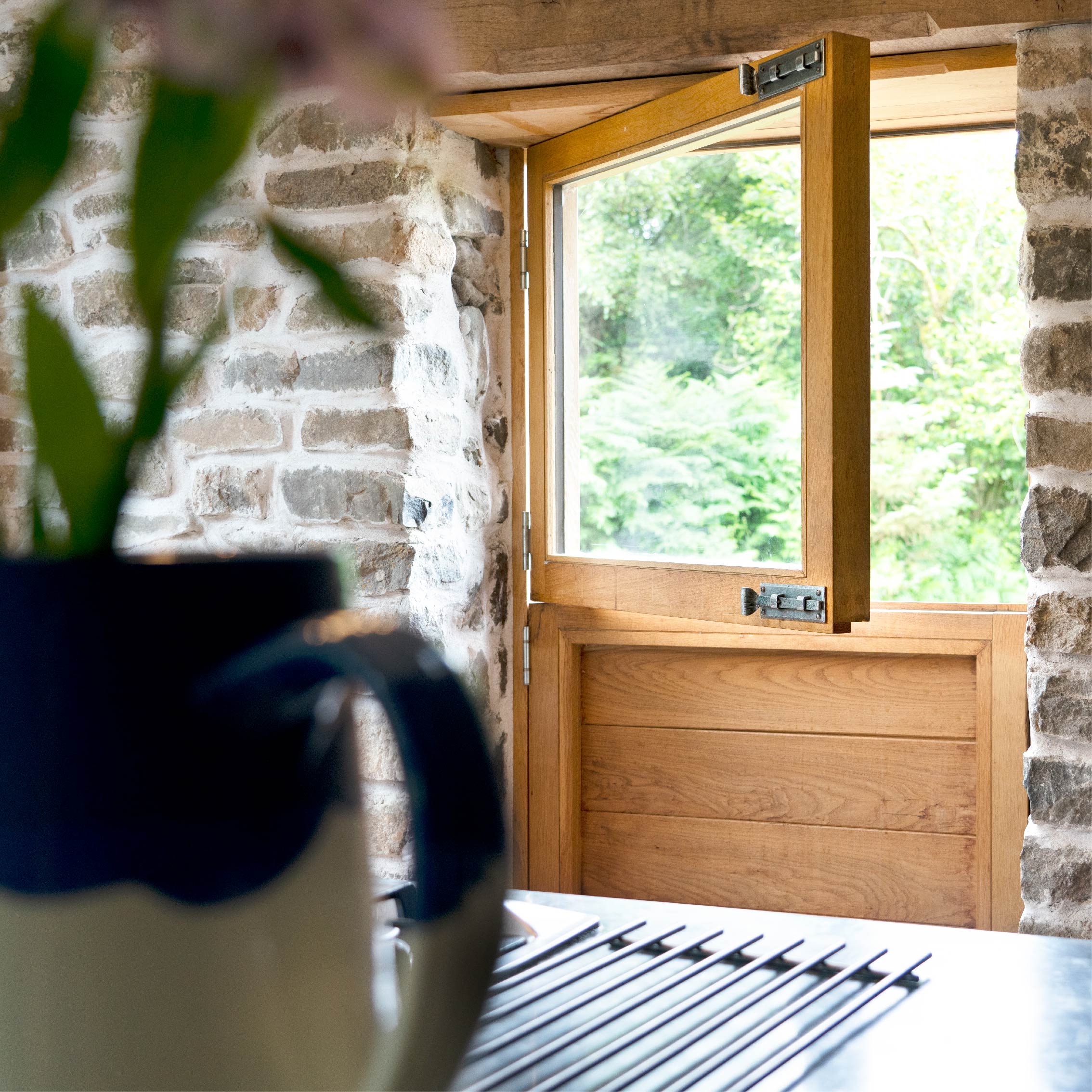 From The Anvil's Pewter Cranked bolts on a wooden stable door