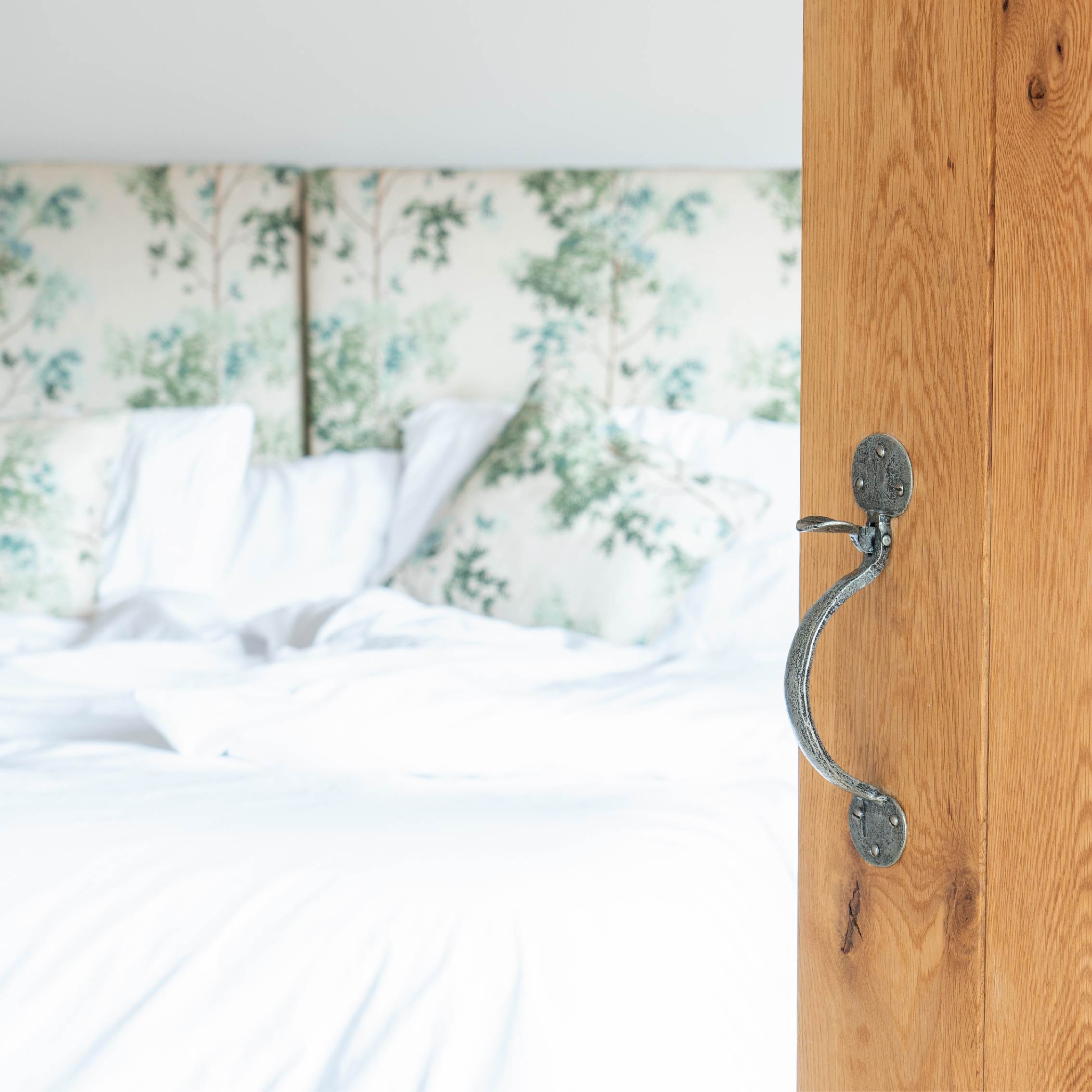 From The Anvils Pewter Bean thumblatch on a wooden ledge and brace door